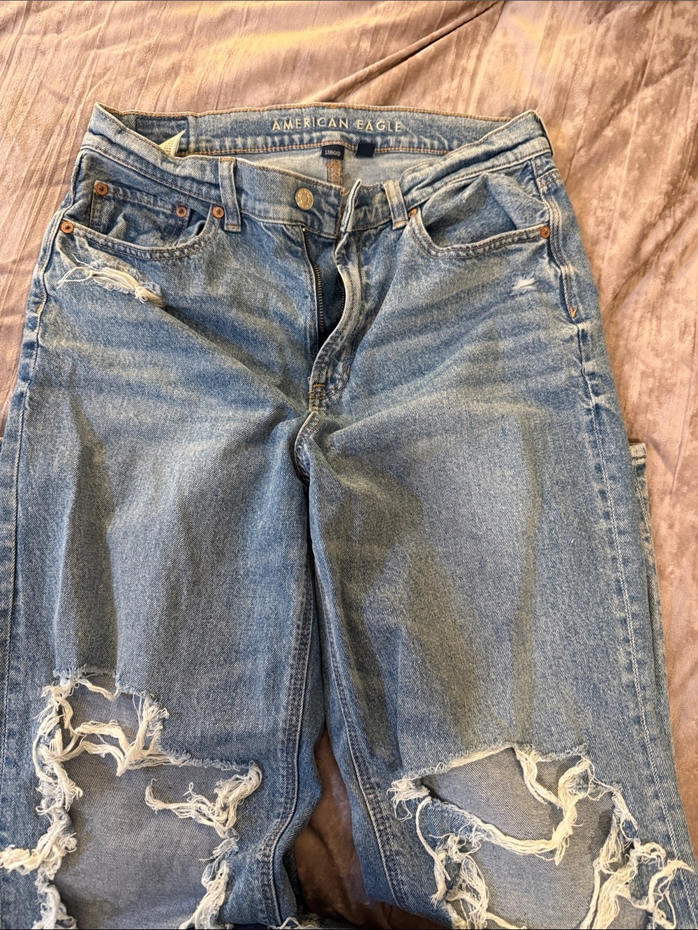 American Eagle Outfitters women’s Distressed Light Blue Denim Jeans